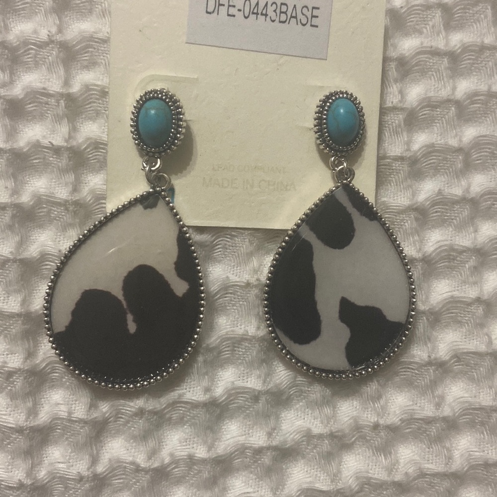 Cow print earrings with teal